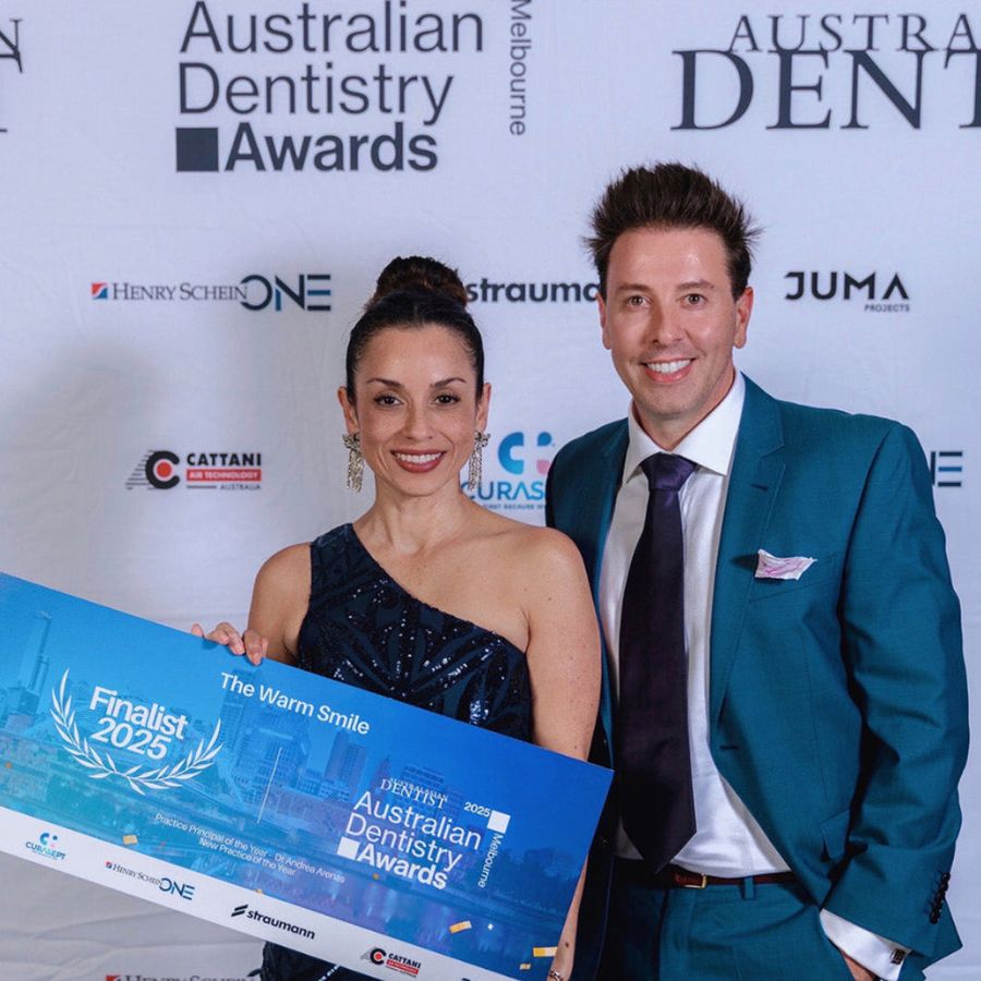 Dr Andrea Arenas at the Australian Dentistry Awards 2025, holding The Warm Smile finalist plaque